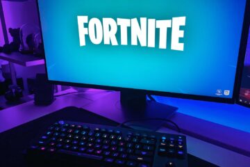 Fortnite Season on black flat screen computer monitor with black computer keyboard